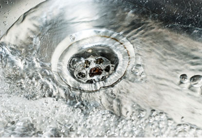 water running down a drain in Richmond, Va